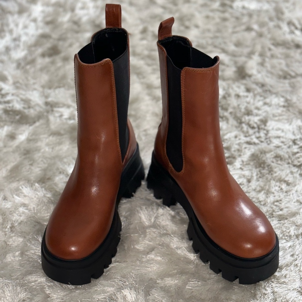 Brown with black accents, brand new Women’s Gianni Bini combat boots size 8.5